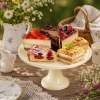 Patera stojak do ciasta tortu na nóżce dekoracja słodkiego stołu beżowa 24cm